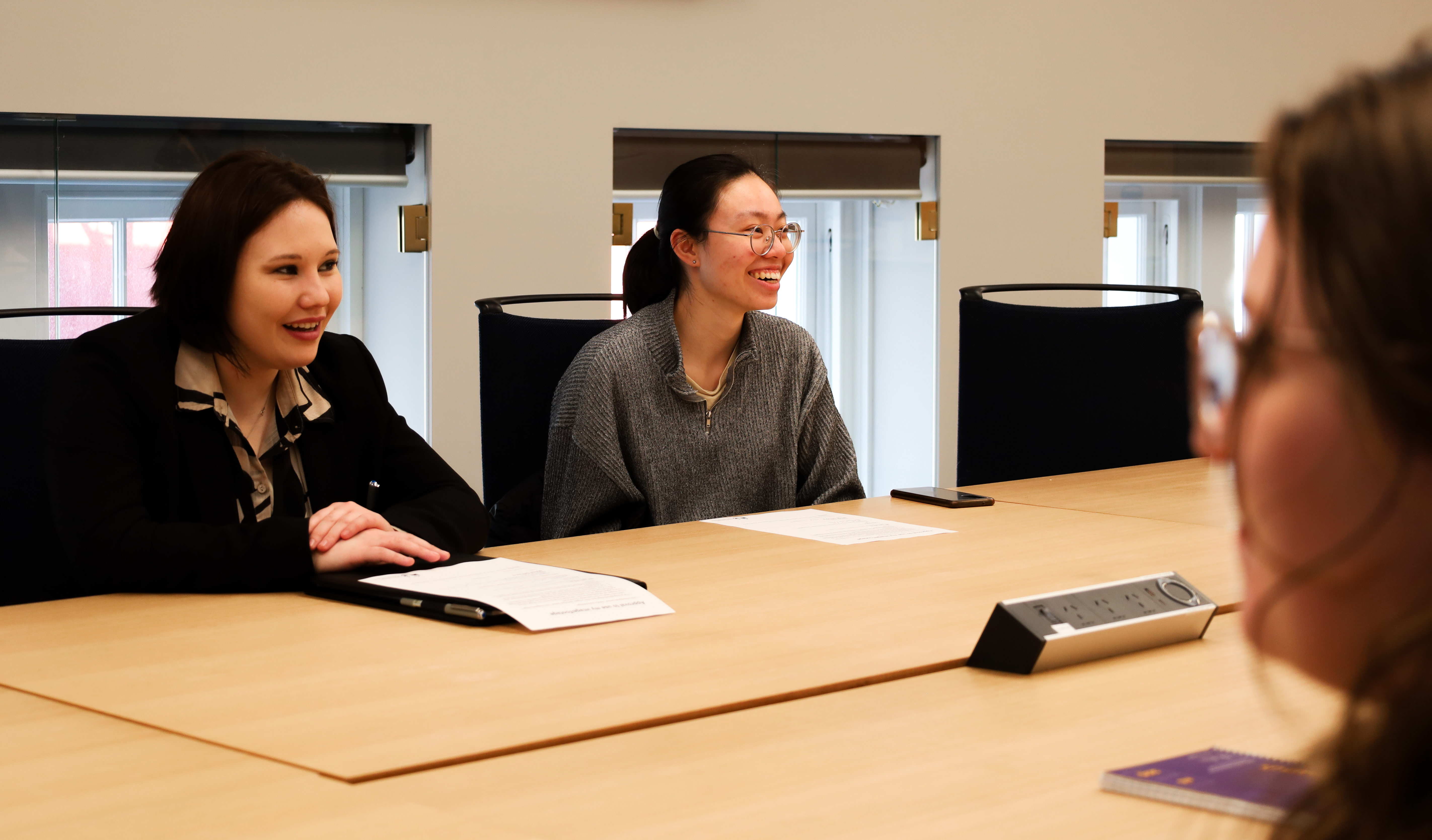 Employee discussion at a table